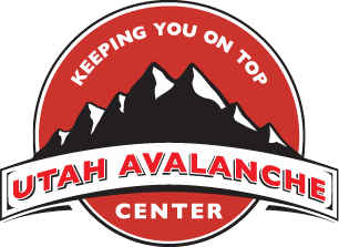 Utah Avalanche Center logo, with mountains and slogan "Keeping You on Top" on a red circle.